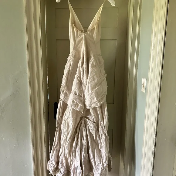 This is a Nicole Miller wedding dress, size 10. It wants to get married again! - Picture 10 of 17
